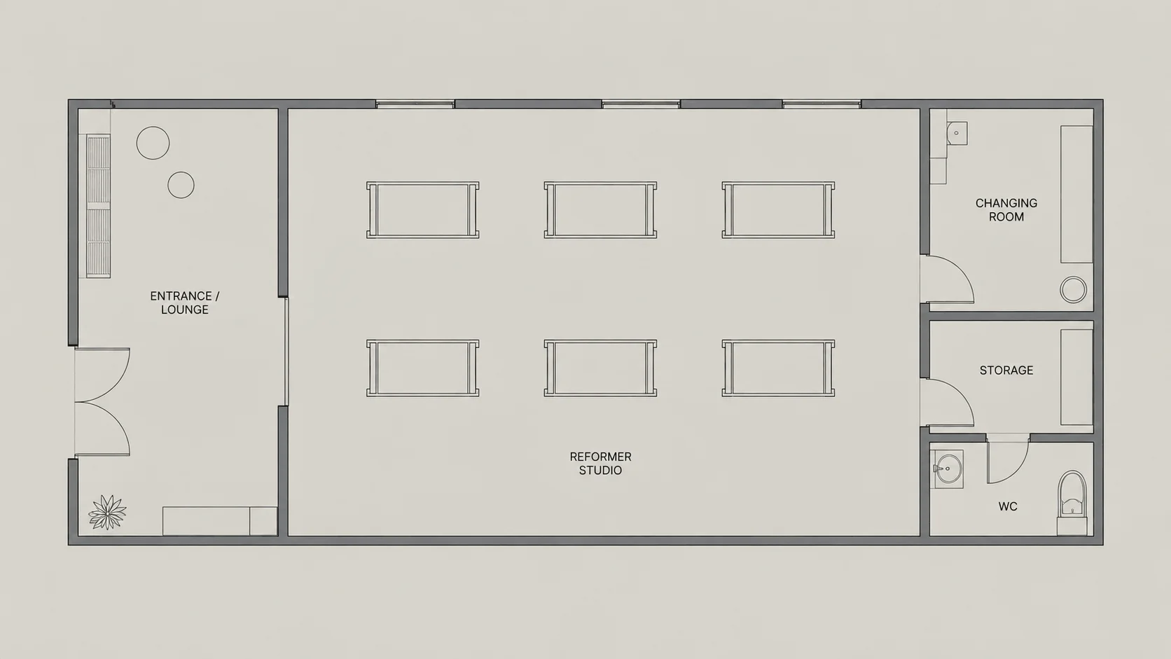 6 reformer Pilates studio floor plan with two rows of reformers, reception, storage and changing room