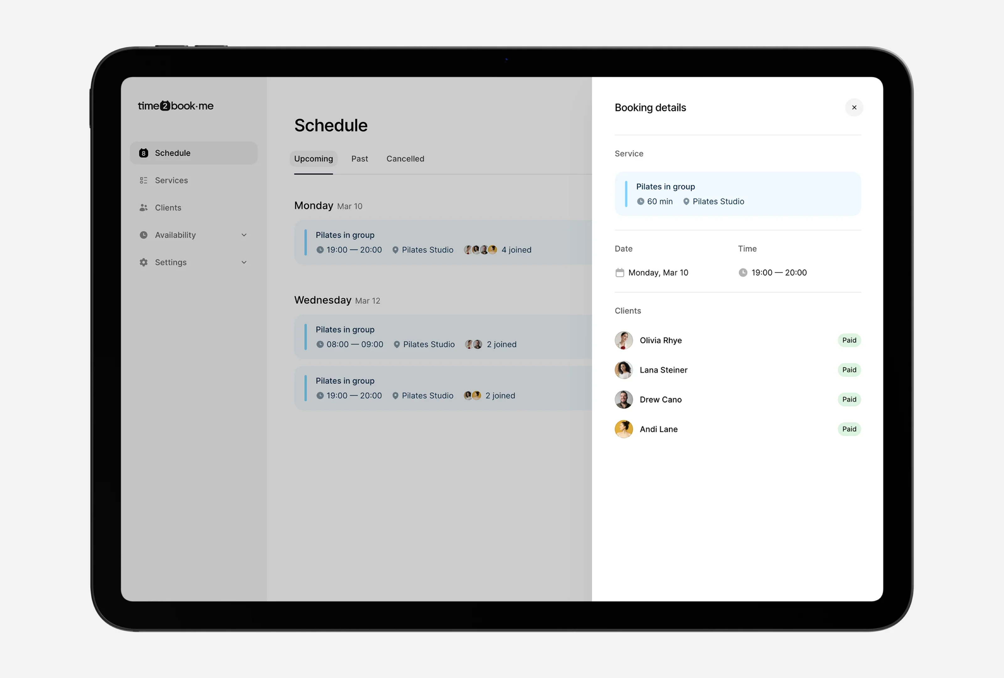 Tablet view of Time2Book studio dashboard showing Pilates class schedule, client list with payment status, and detailed booking info for a 60-minute group session.