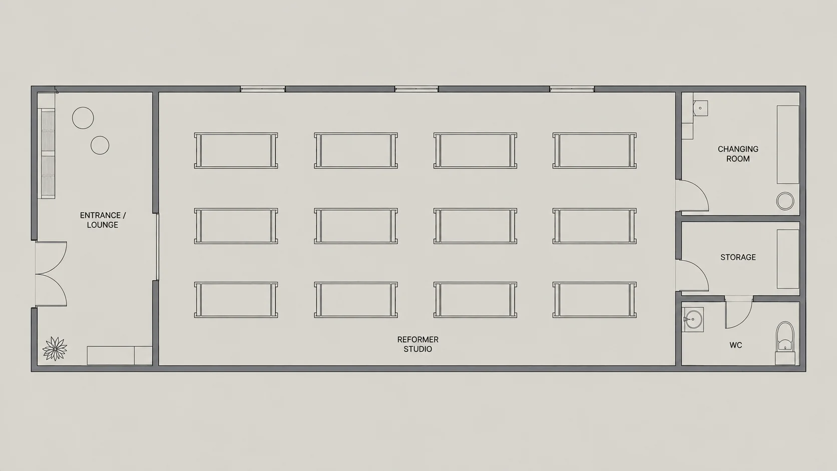 12 reformer Pilates studio floor plan with three rows of four reformers, storage, changing room and WC