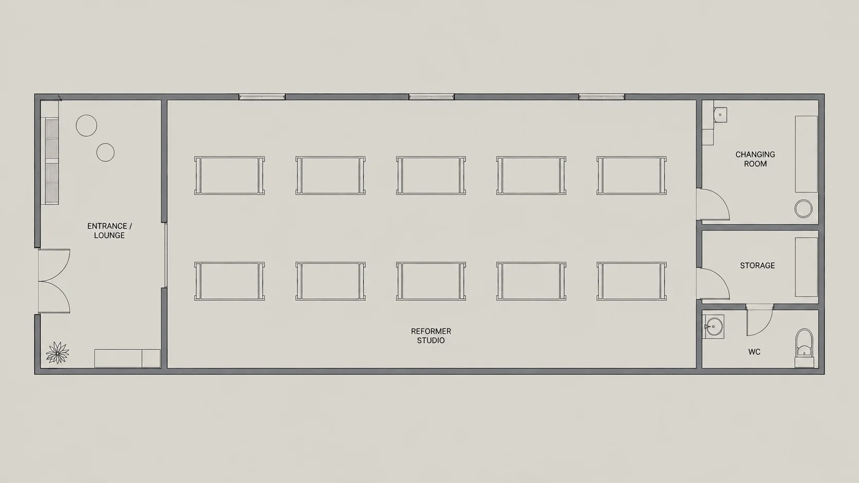 10 reformer Pilates studio floor plan with two rows of five reformers, reception and changing facilities