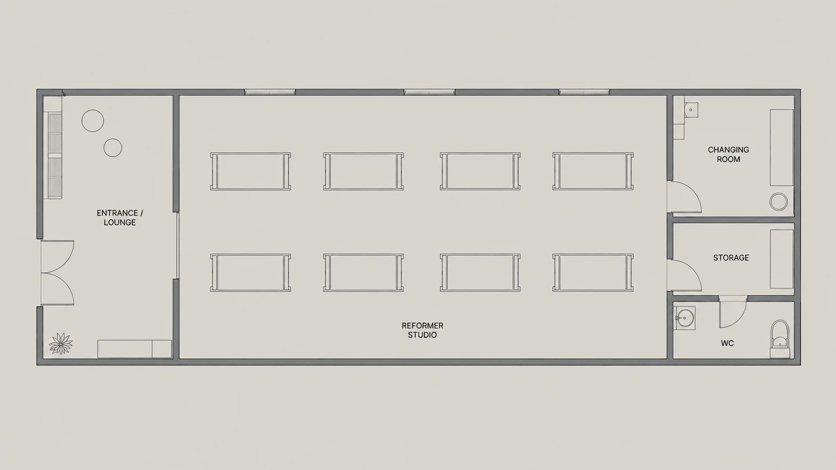 8 reformer Pilates studio floor plan with two rows of four reformers and client facilities