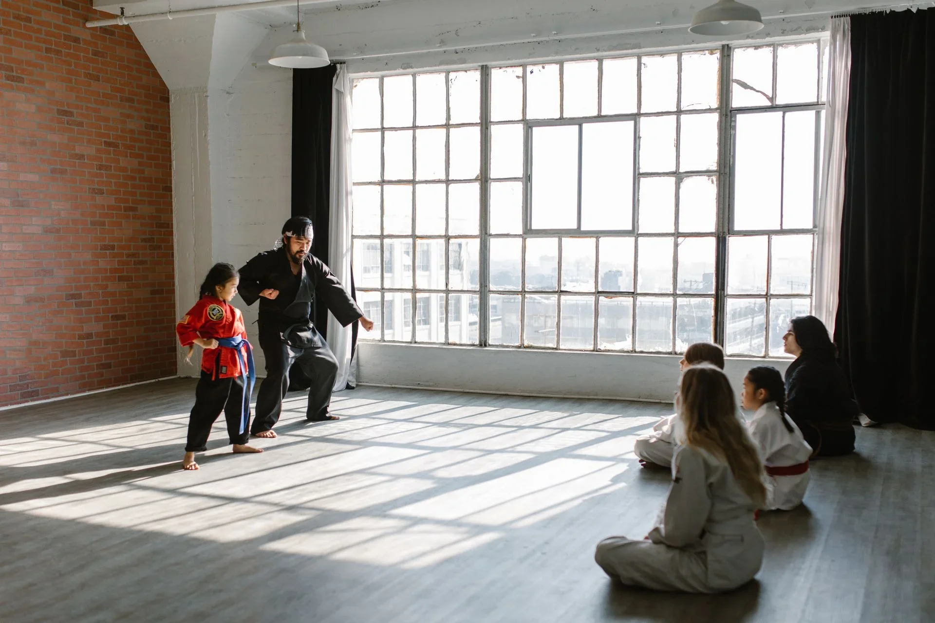 martial arts instructor managing class bookings and student memberships online